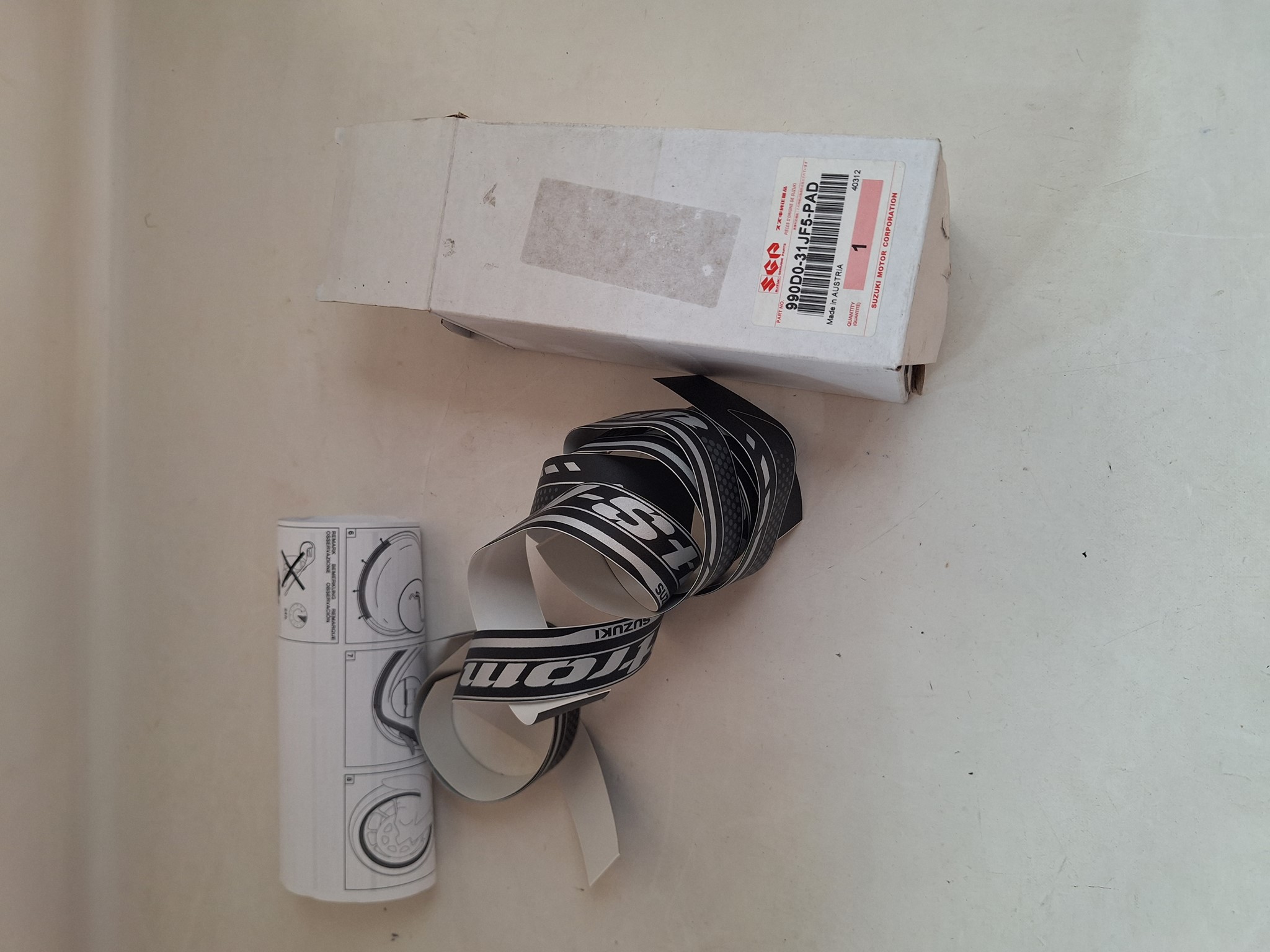 Picture of SUZUKI  FELGENDEKORE HIRA DL1000AL4  990D0-31JF5-PAD